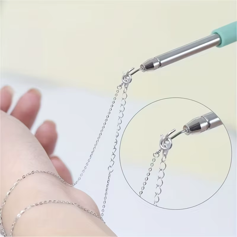 Outil d'aide à la pose de bracelets et bijoux