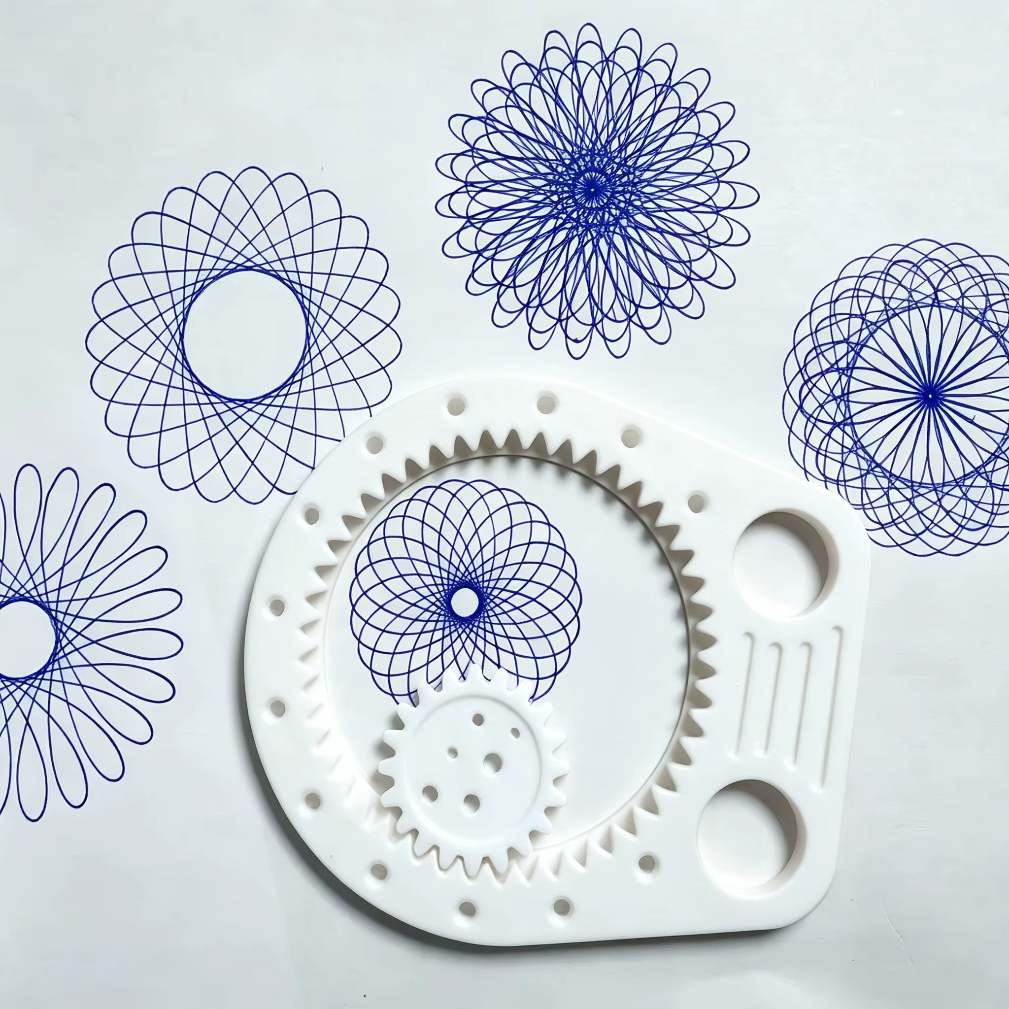 Outil de dessin multifonctionnel, règle de dessin multifonctionnelle, permet de dessiner divers motifs individuels et courbes avec une simple rotation.