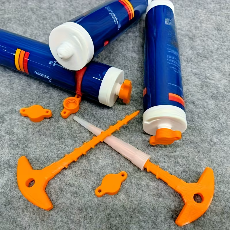 Bouchon d'étanchéité en Silicone et outil de retrait de buse de pistolet de joint
